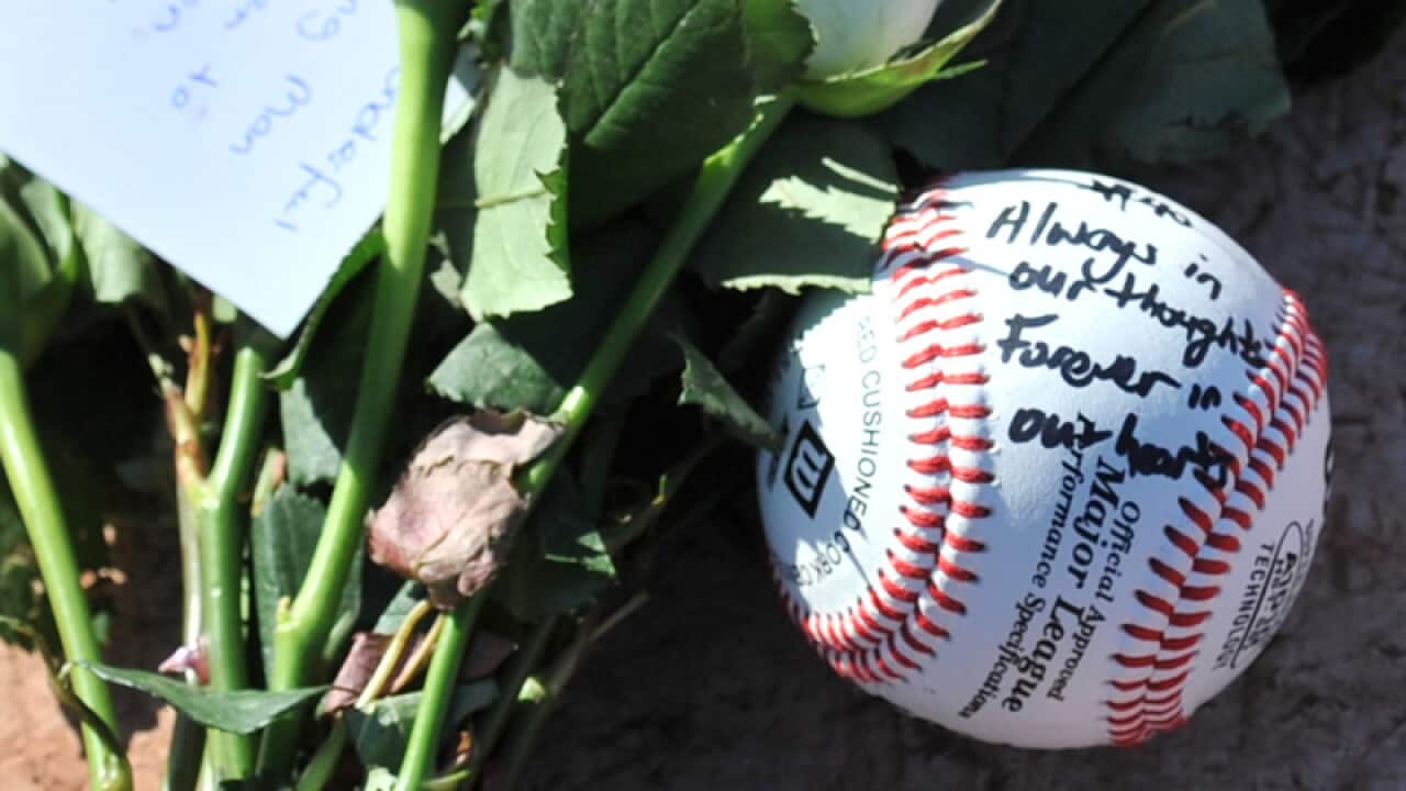file photo of a tribute to Chris Lane