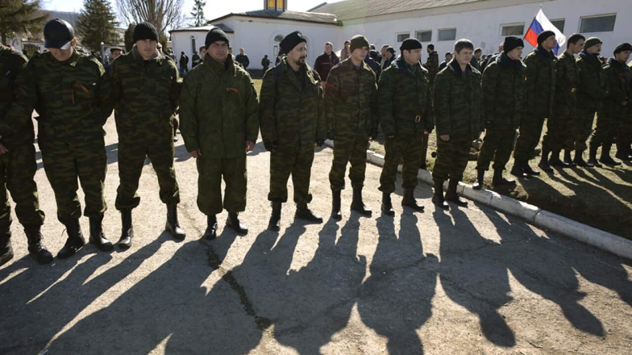 Pro-Russian activists block access to a Ukrainian border guards base