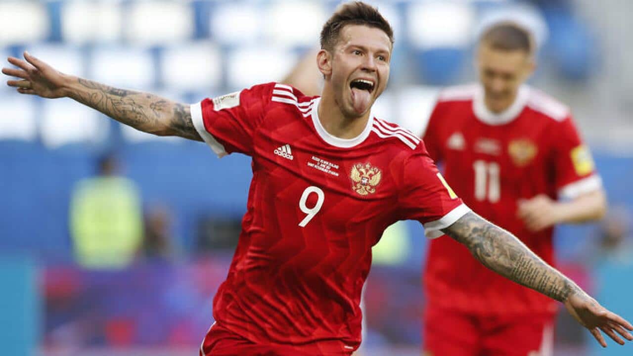 Fedor Smolov celebrates scoring.