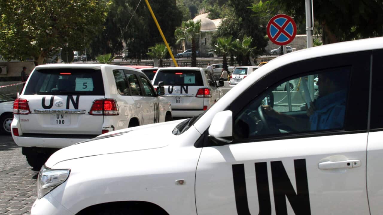 A convoy of UN inspectors in Damascus