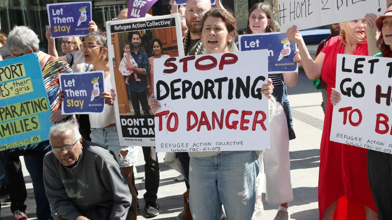 Supporters wait for a judgment in September on whether a Tamil family from Biloela will be deported to Sri Lanka