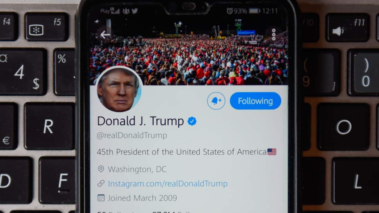 In this photo illustration a Donald Trump twitter account seen displayed on a smartphone with a laptop keyboard on the background. (Photo by Omar Marques / SOPA Images/Sipa USA)