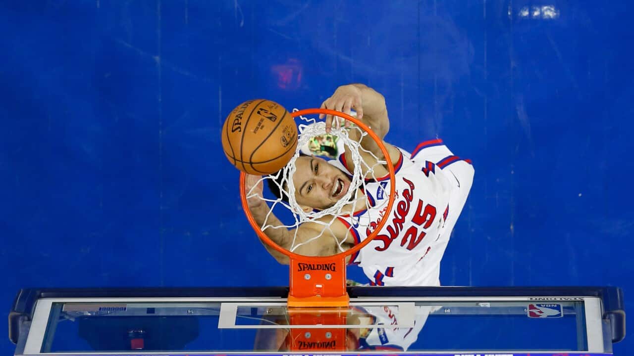 Philadelphia 76ers' Ben Simmons tries to dunk during the second half of an NBA basketball game against the Boston Celtics, Thursday, Jan. 9, 2020, in Philadelphia. (AP Photo/Matt Slocum)