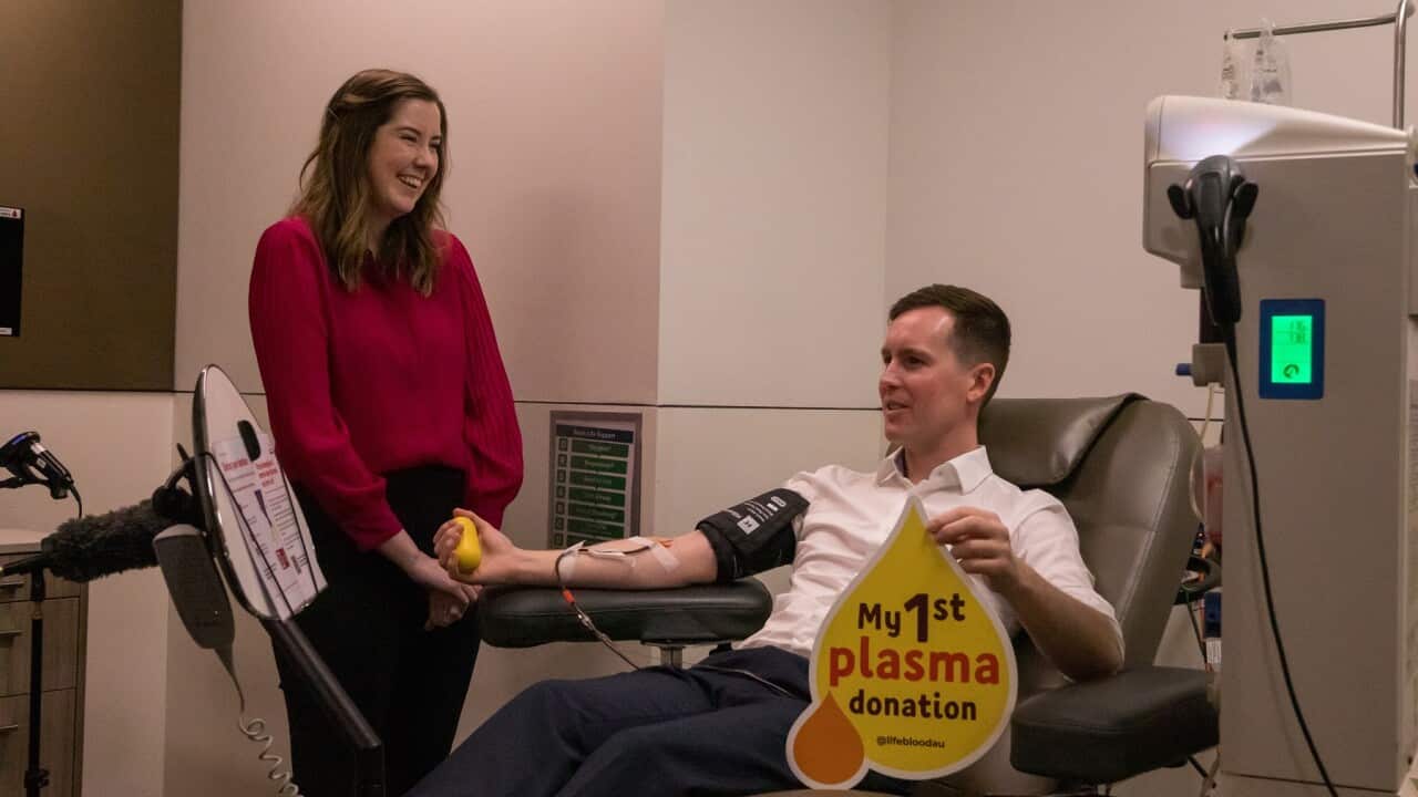 Hayley Teasdale speaking to Chris Steel as he donates plasma for the first time