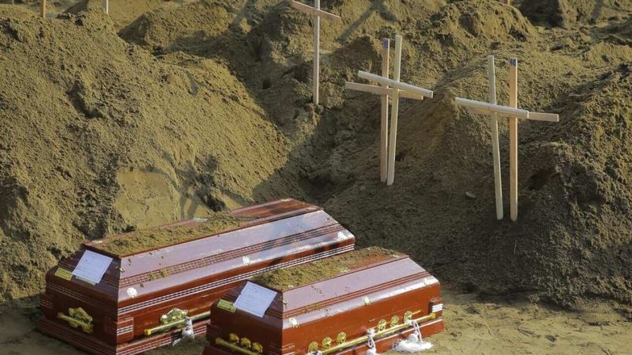 A file image of the coffins of the victims of the Negombo attack