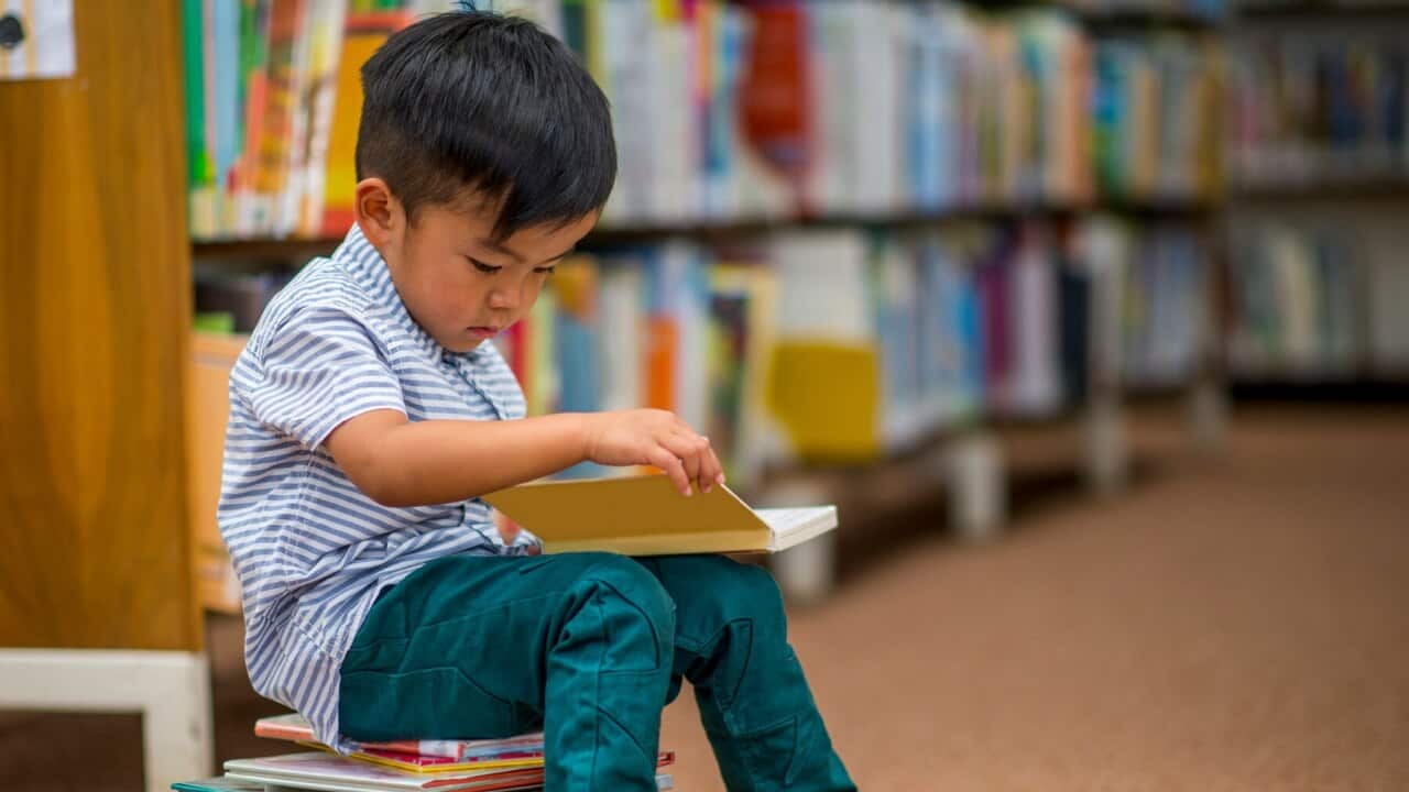 A child reading in a library