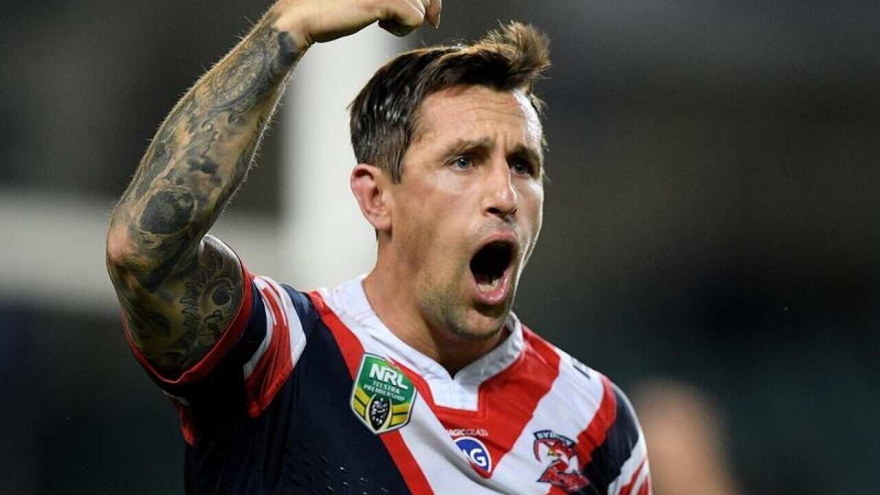 Mitchell Pearce of the Roosters gestures