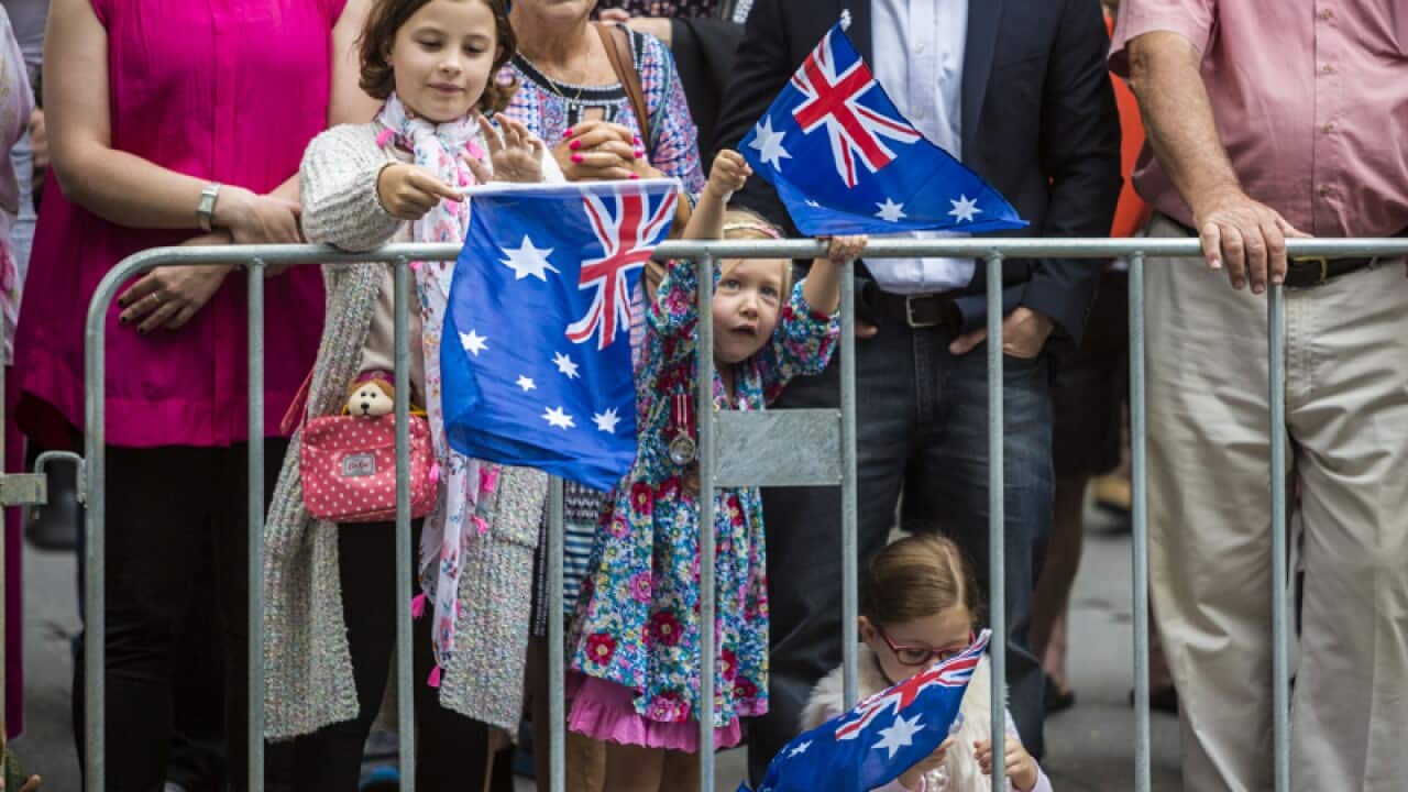 Spectators at the Anzac Day parade in Brisbane