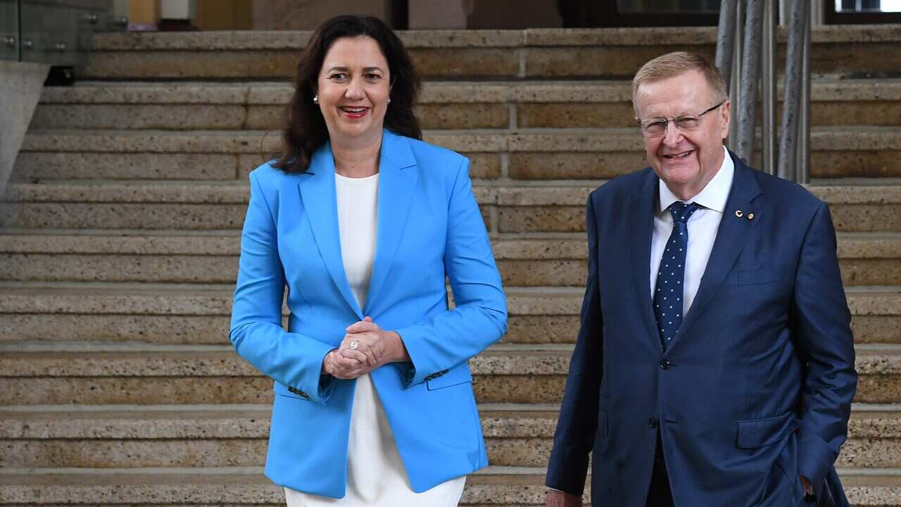 QLD Premier Annastacia Palaszczuk and AOC President John Coates are seen after a media conference announcing Queensland's bid to host the 2032 Olympics.