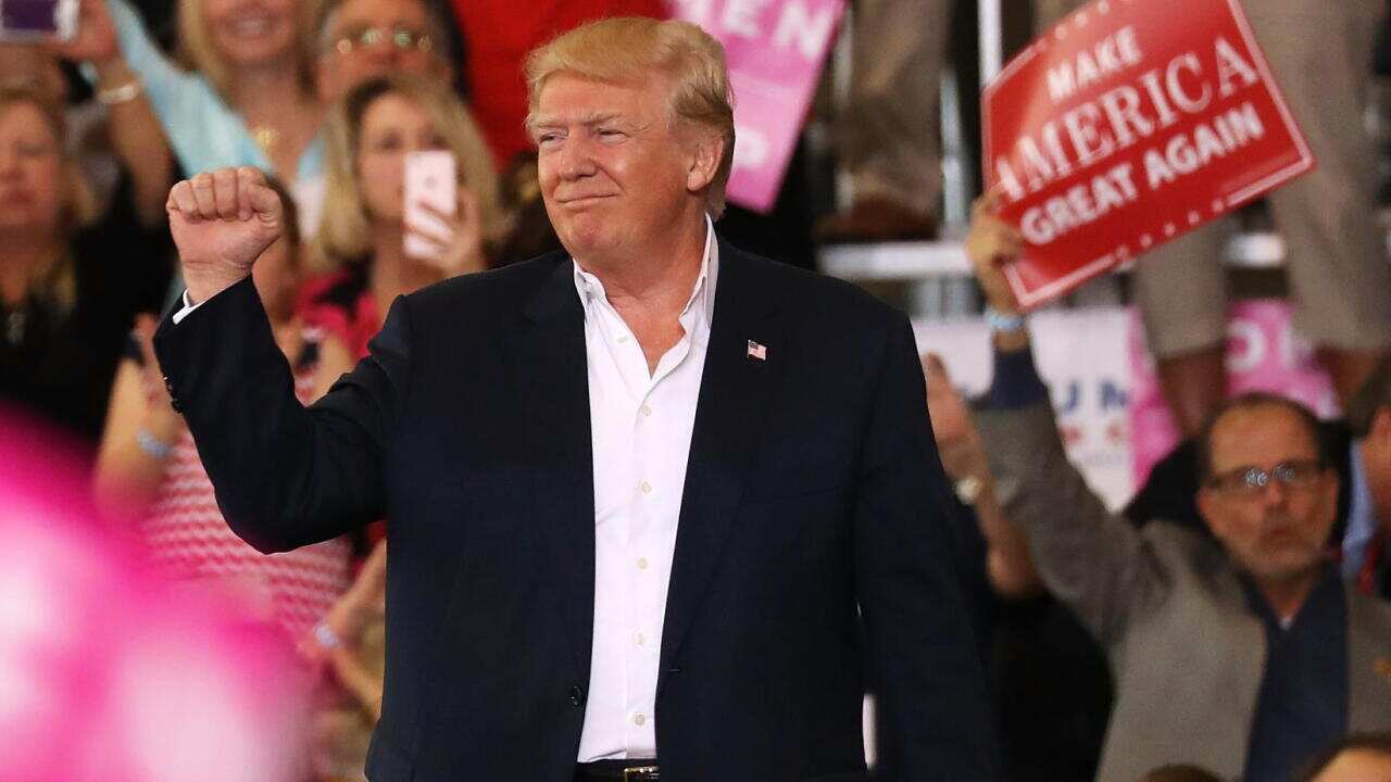 President Donald Trump speaks during a campaign rally at the AeroMod International hangar at Orlando Melbourne International Airport on February 18, 2017.