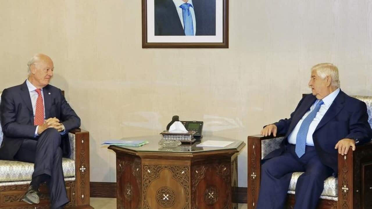 UN Syria envoy Staffan de Mistura and Foreign Minister Walid Moallem
