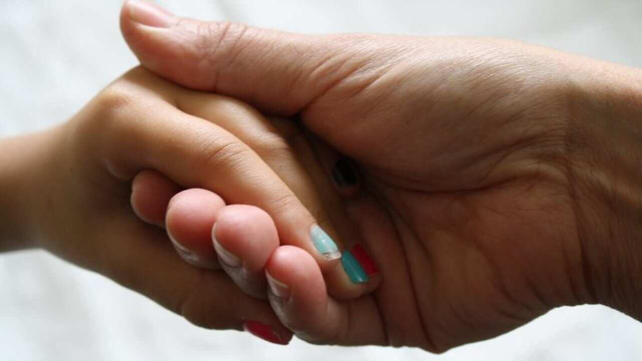 holding hands