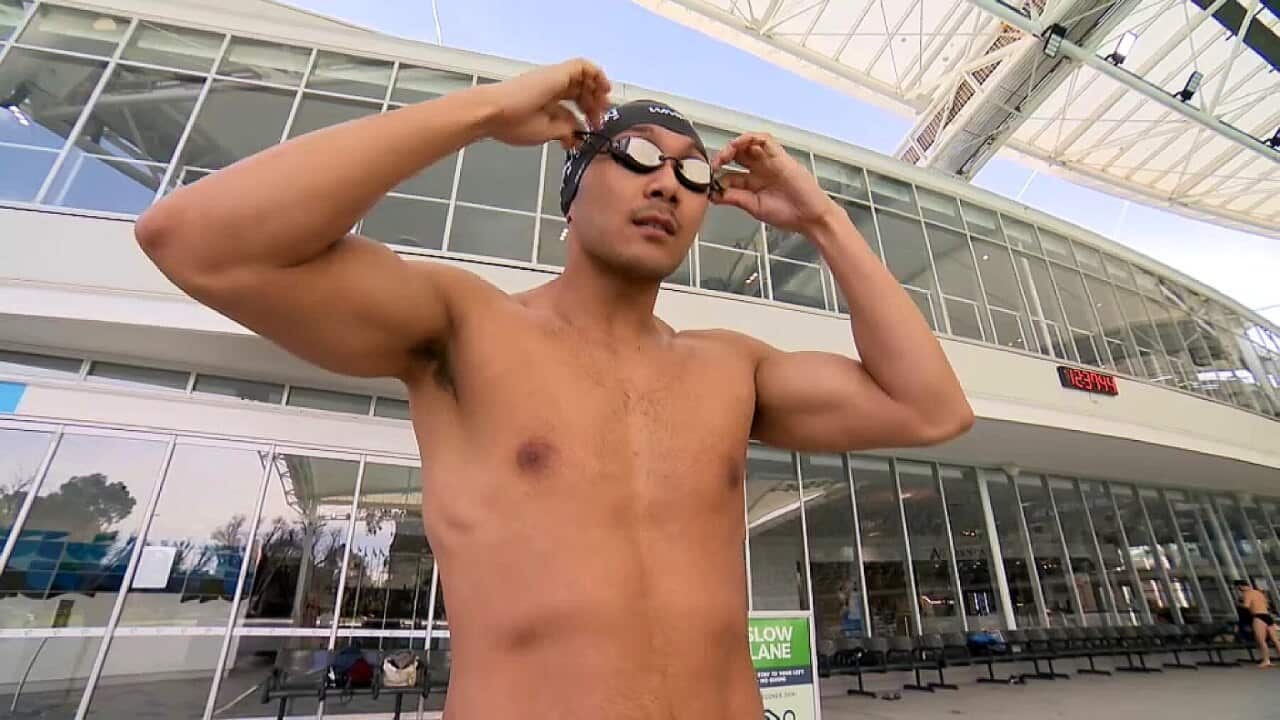 Win Htet Oo prepares for a practice swim