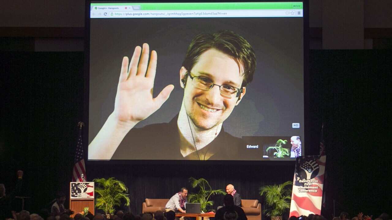 Edward Snowden appears on a live video feed broadcast from Moscow at an event sponsored by ACLU Hawaii in Honolulu