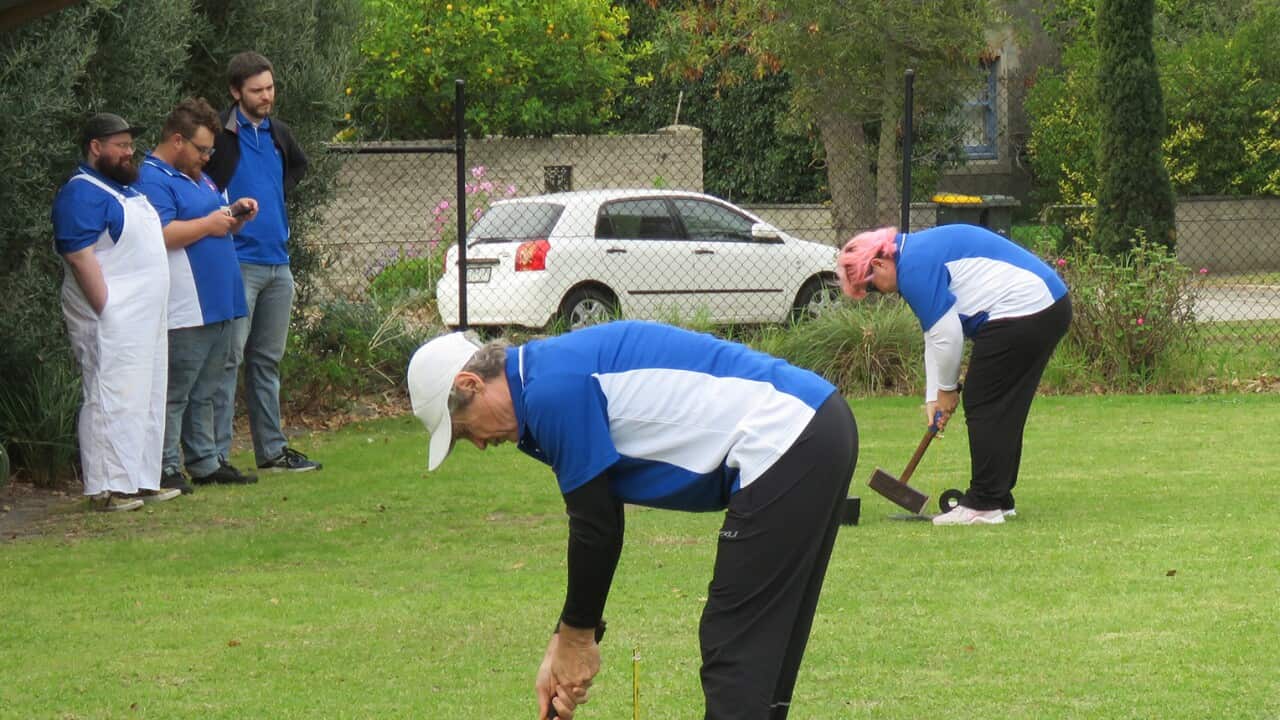 Dr Paul Thomas (left), the captain of Footscray Trugo team and his teammate Eilis, playing in the Grand Final Victorian Trugo League 2022.