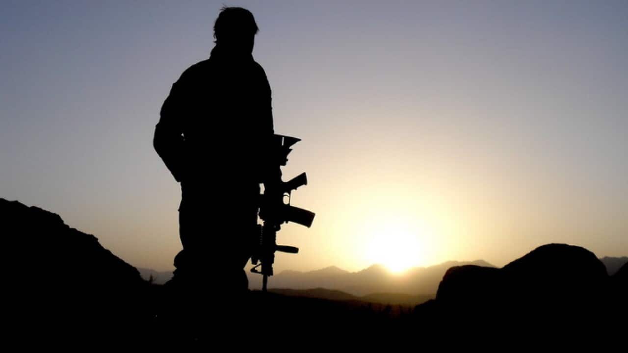 Supplied image obtained Thursday, May 9, 2013, An Australian Special Operations Task Group soldier observing the valley during the Shah Wali Kot Offensive. Afghan National Security Forces (ANSF) partnered with Australian Special Forces from the Special Op