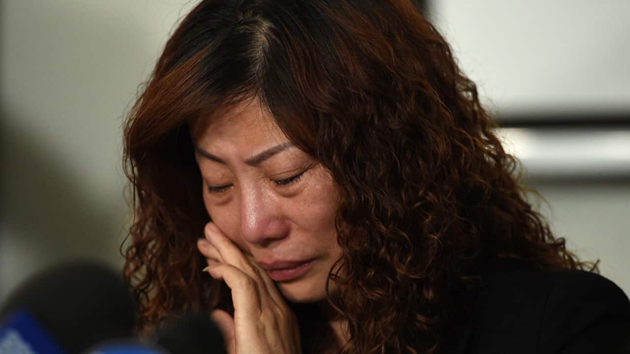 Mei Zhang, the mother of Chinese student Mengmei Leng