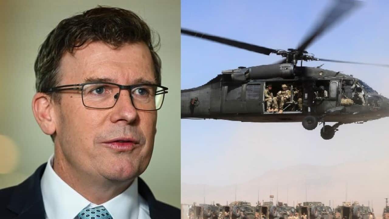 الن تاج (راست) و سربازان آسترالیایی در جریان یک عملیات مشترک با نیروهای امنیتی افغانستان