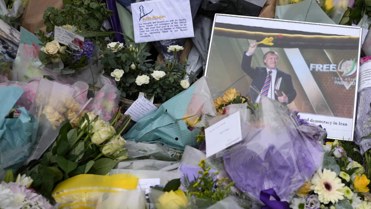 Floral tributes laid near to where David Amess was killed during a meeting with constituents in Leigh-on-Sea, Essex, Sunday, Oct. 17