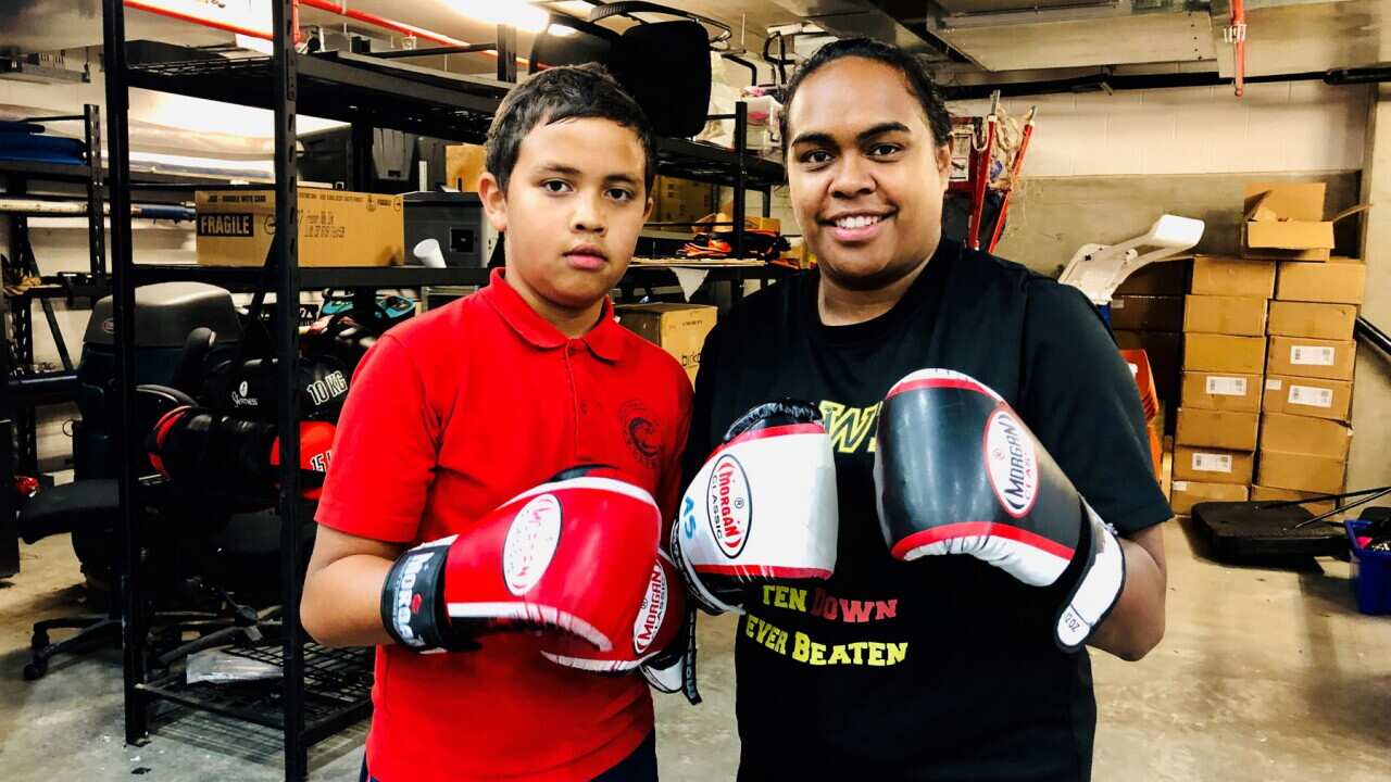 NRL player Lavina O'Mealey, right, is a senior mentor at the Clean Slate Without Prejudice program