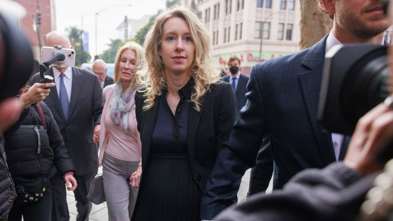 Elizabeth Holmes (centre), the founder of the failed blood testing start-up company Theranos, arrives at the Robert F. Peckham Federal Building and US Courthouse for her sentencing hearing in San Jose, California.