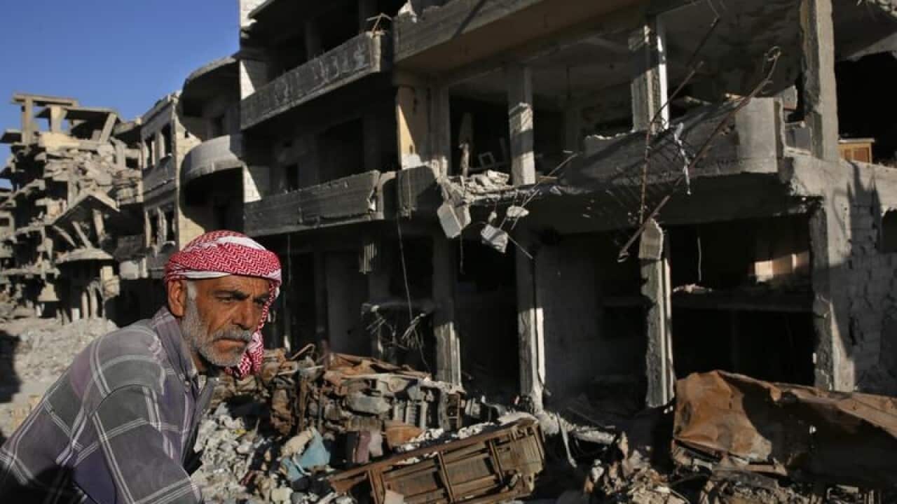A Syrian man trapped in the bombed-out Syrian city of Raqqa.