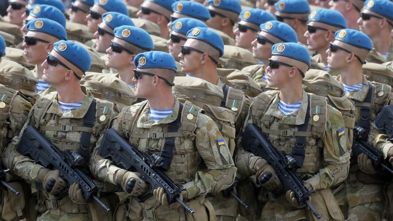 Ukrainian soldiers march along Khreshchatyk Street during a military parade to celebrate Independence Day in Kiev.
