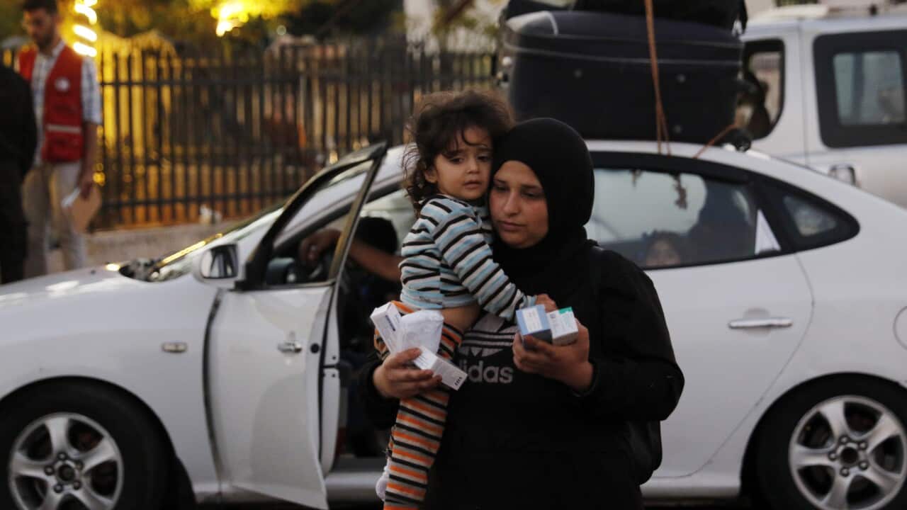 People who fled from southern Lebanon enter Syria following Israeli military strikes in recent days