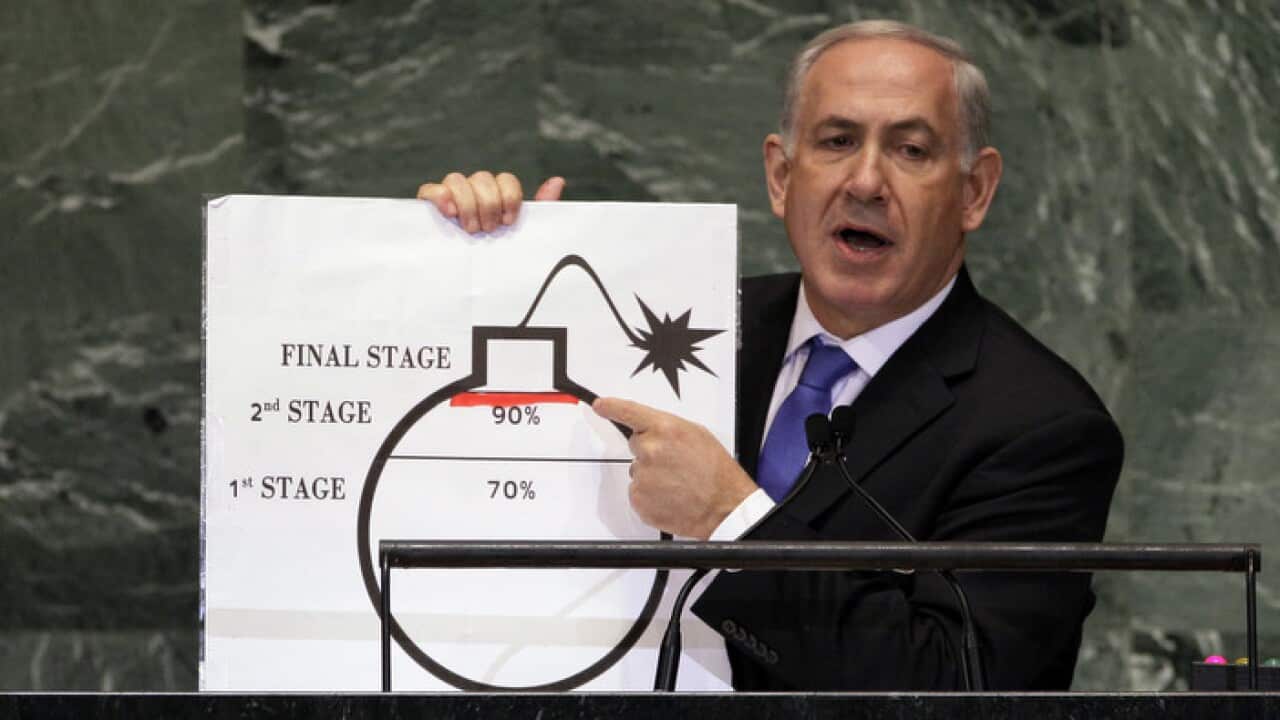 Israeli Prime Minister Benjamin Netanyahu shows an illustration as he describes his concerns over Iran's nuclear ambitions