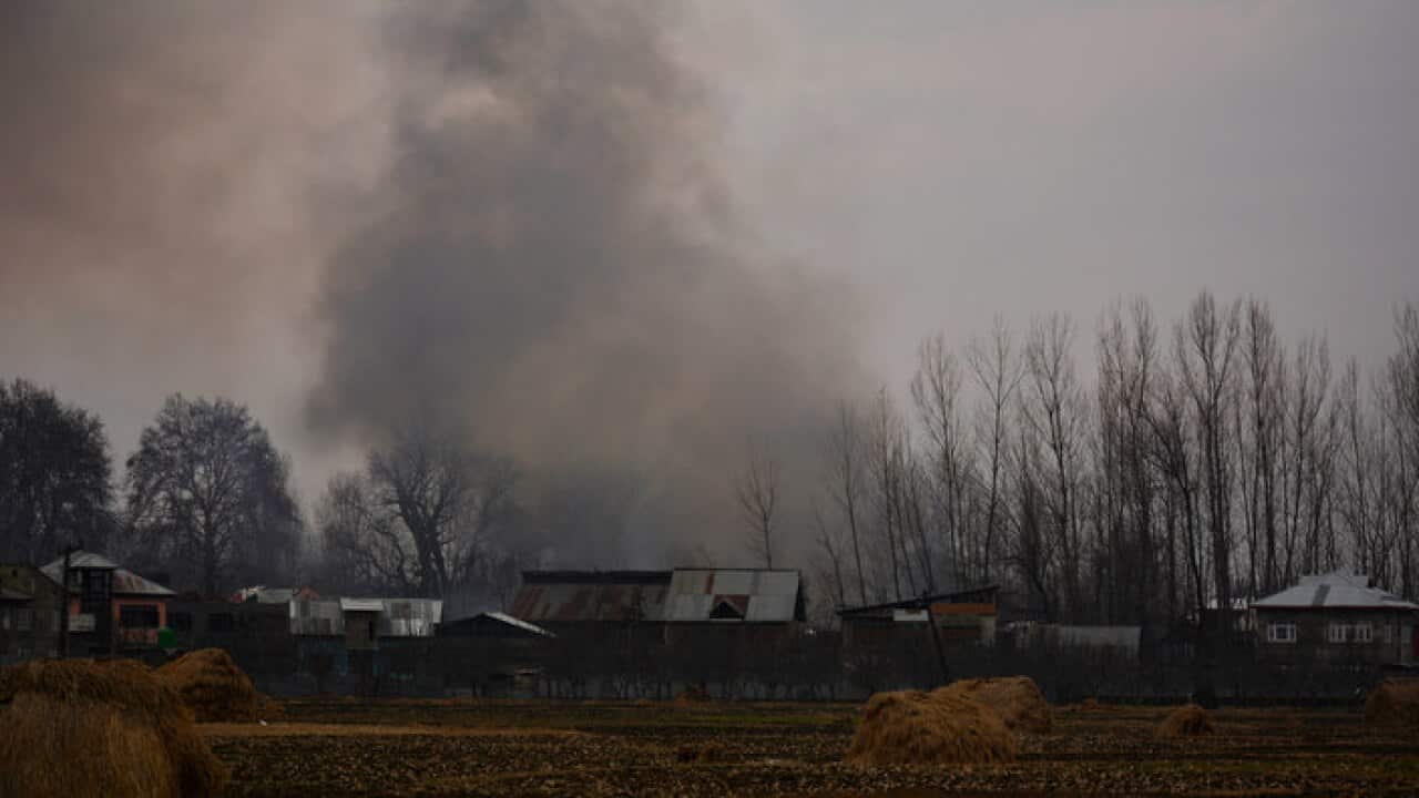 Indian paramilitary troopers set ablaze four residential houses where militants were in Pulwama south of Srinagar, Kashmir