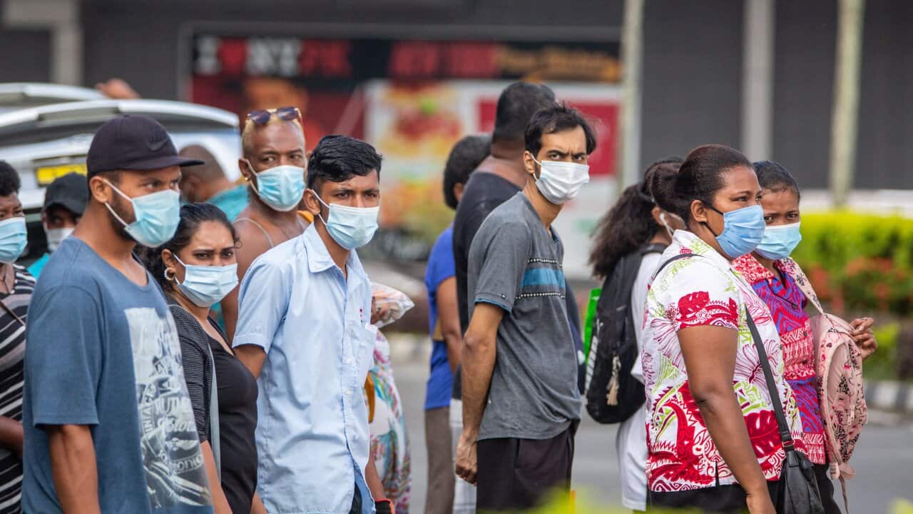 Residents wearing face masks in the Fijian capital Suva on 24 April, 2021.