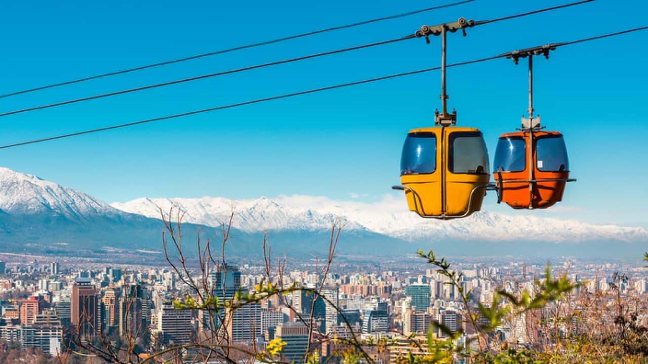 Overhead Cable Cars Against Sky In City