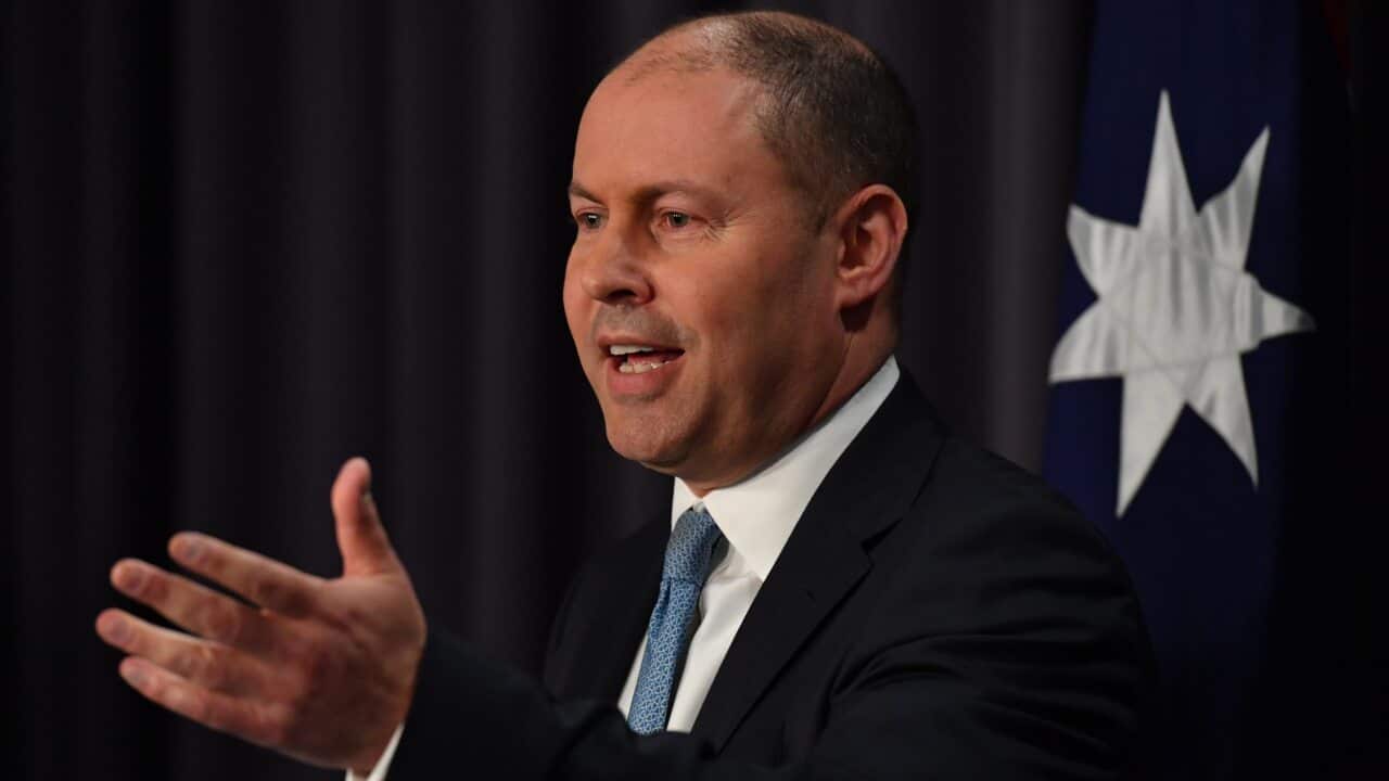 Treasurer Josh Frydenberg addresses the media during a press conference as he hands down the Mid-Year Economic and Fiscal Outlook.