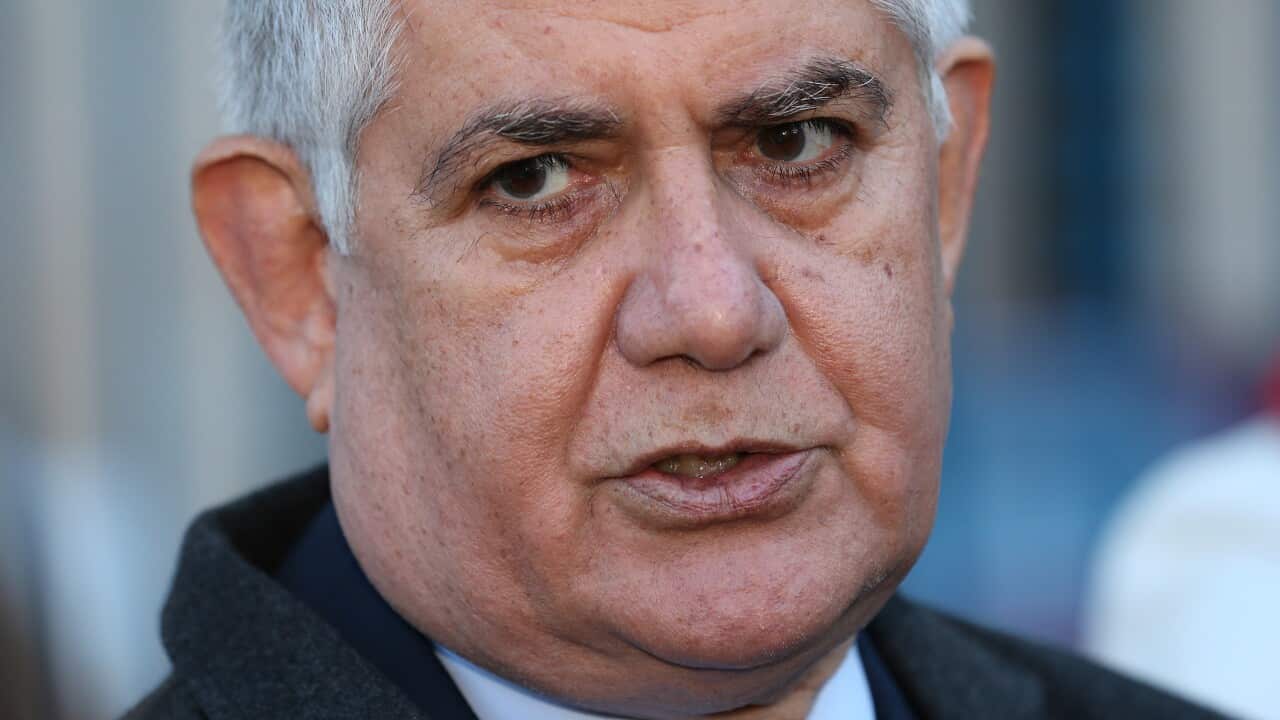 Ken Wyatt arrives to the NAIDOC meeting to consider the model for a referendum on indigenous recognition in Kirribilli, Sydney, Monday, July 6, 2015. (AAP Image/David Moir) NO ARCHIVING