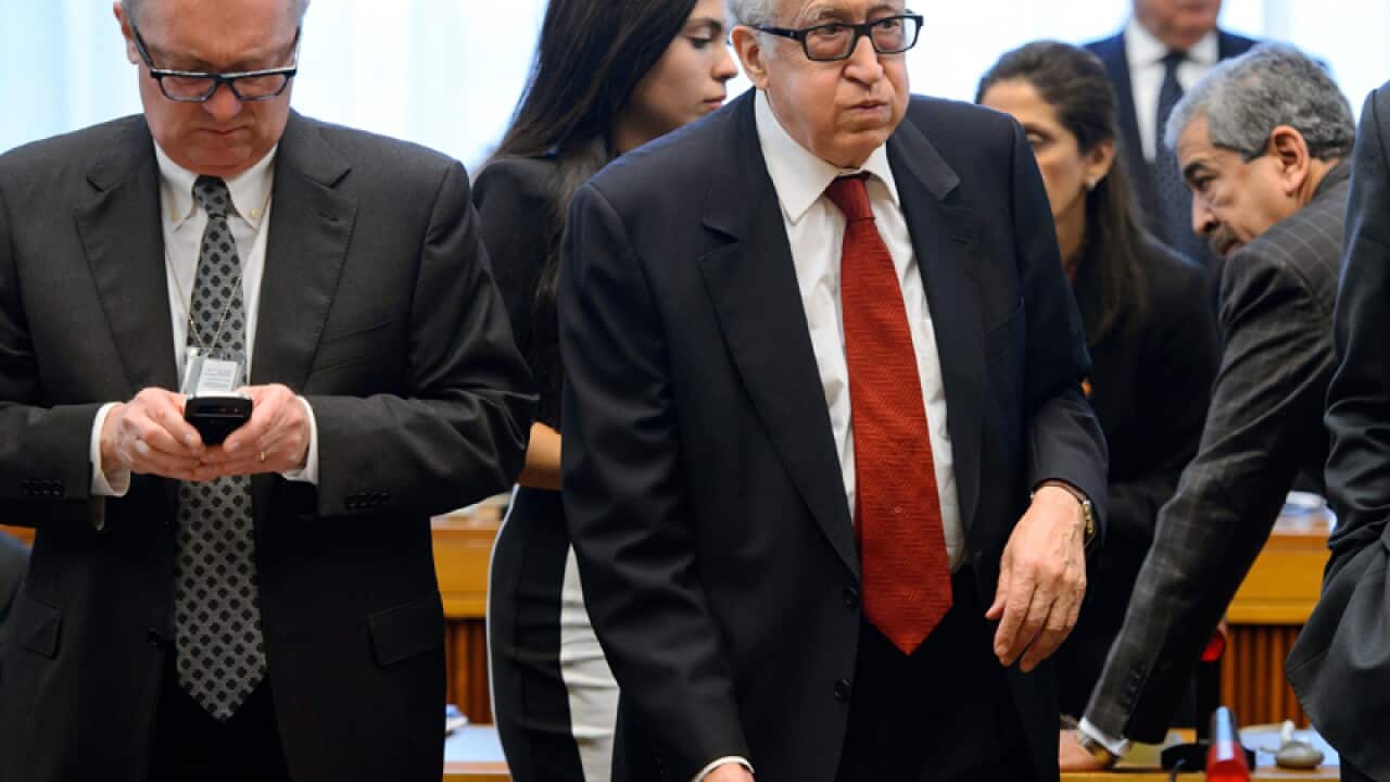 UN-Arab League envoy Lakhdar Brahimi, center
