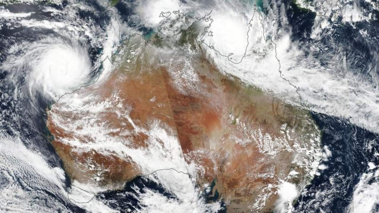 Cyclone Veronica is seen over WA and Cyclone Trevor over NT