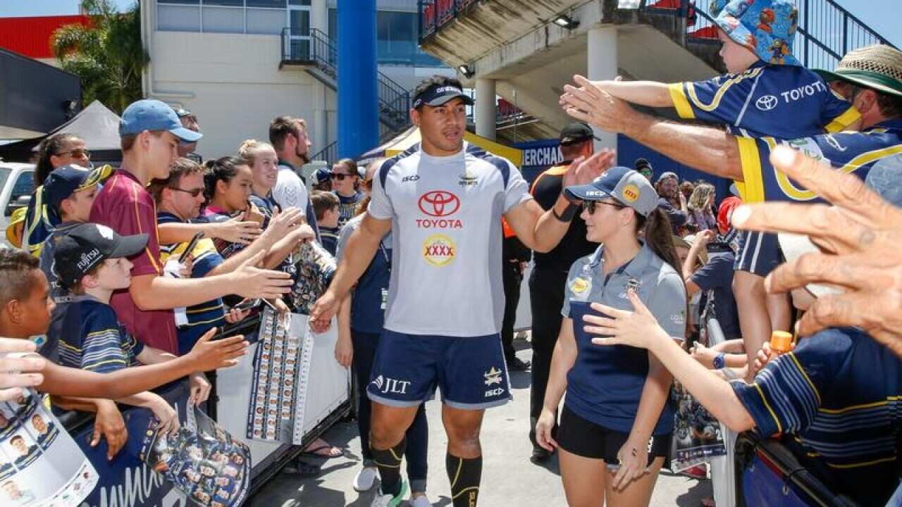 Jason Taumalolo of the Cowboys meets with fans.