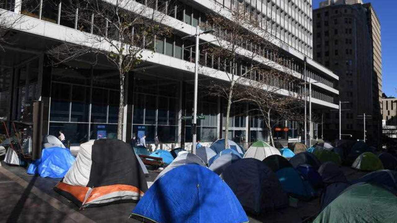 A tent city housing the homeless in Martin Place directly adjacent to the main entrance to The Reserve Bank of Australia (RBA) building in Sydney.