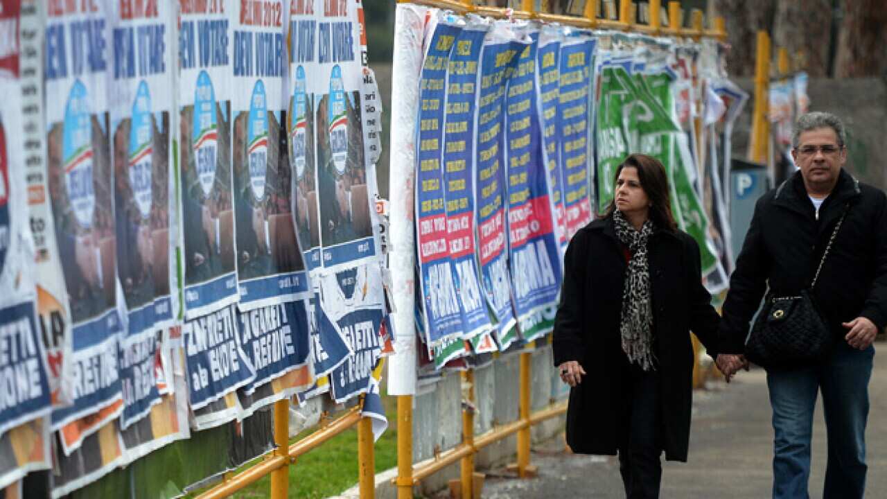 italy_election_billboard_getty_130223_b_311260827