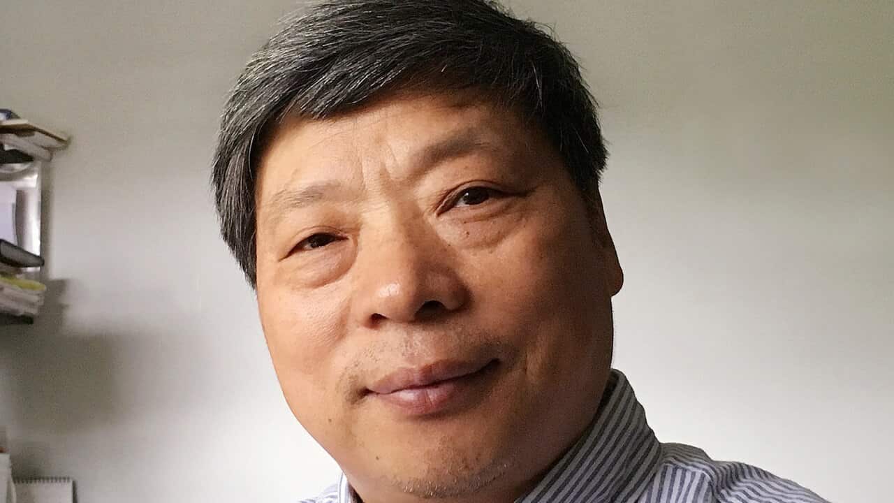 In this photo taken on July 2018 and released by Xu Xiaoli on Wednesday, Nov. 28, 2018, Lu Guang poses for a photo in New York.