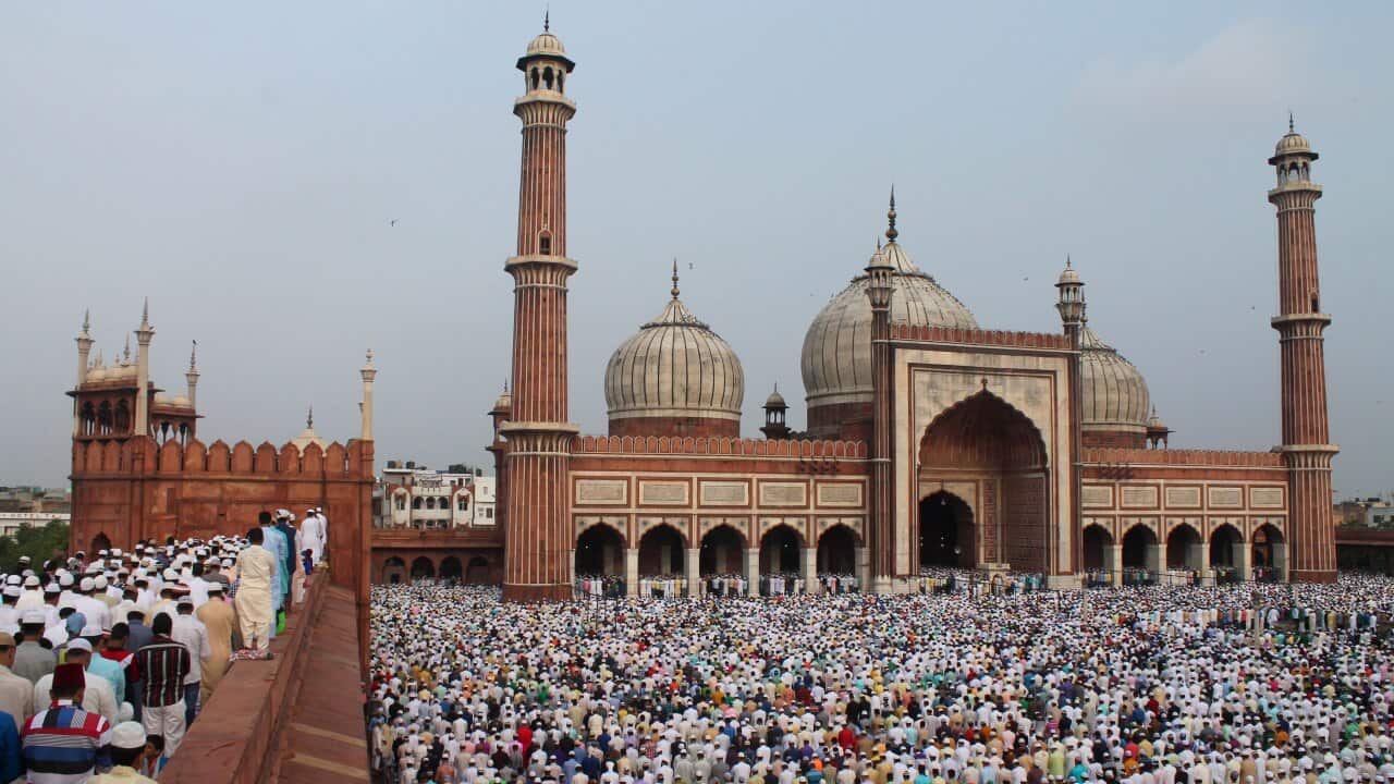 People offer prayers during Eid al-Fitr at the Jama Masjid mosque in New Delhi