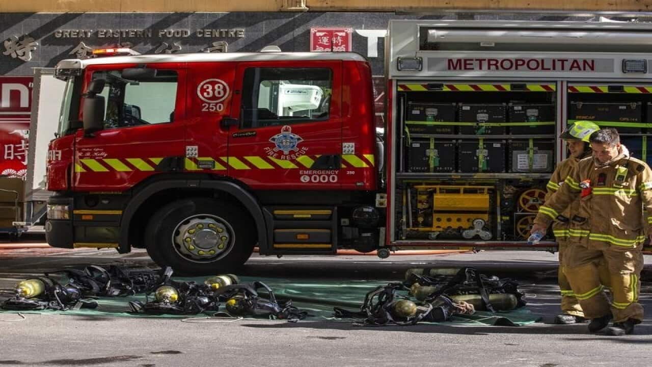 Firefighters are seen at the site of a restaurant fire in Melbourne.