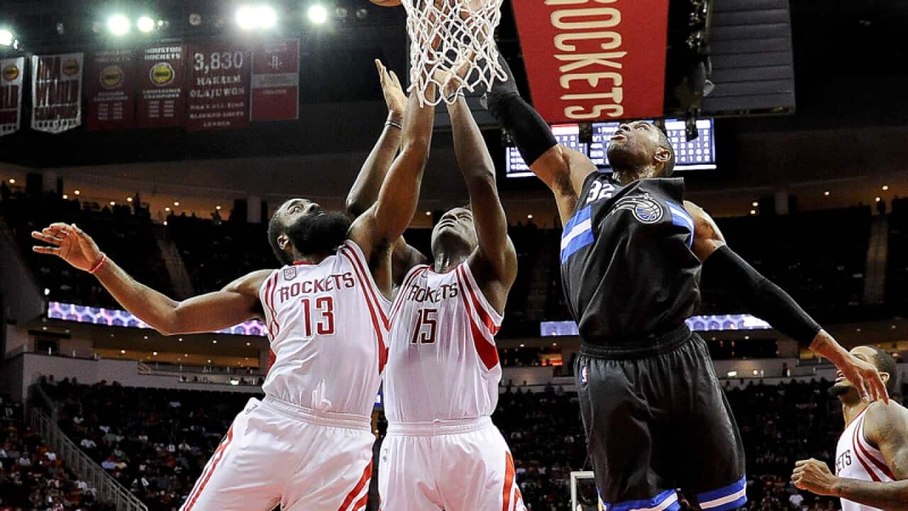 Houston Rockets guard James Harden (L)