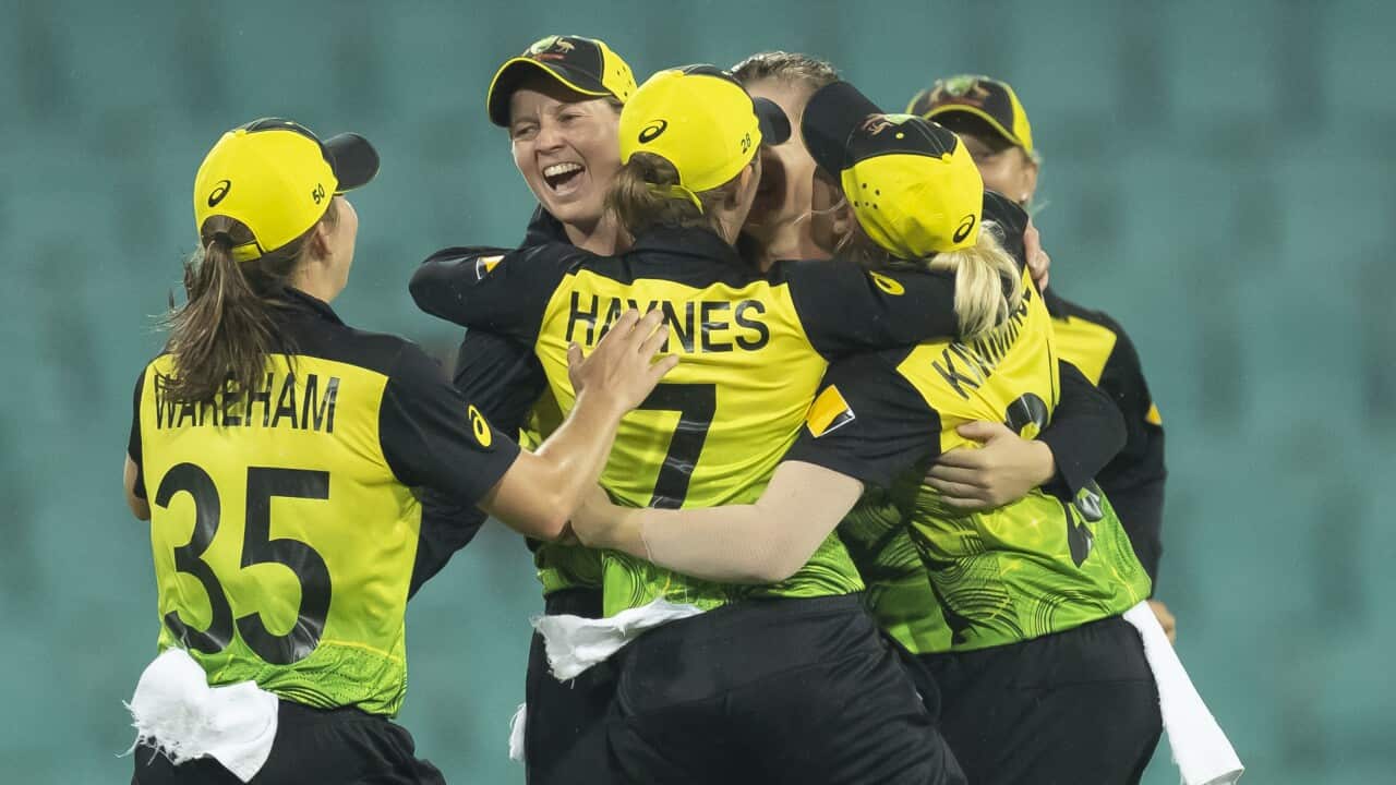 Australia celebrate after the Women's T20 World Cup semi-final match between Australia and South Africa at the SCG