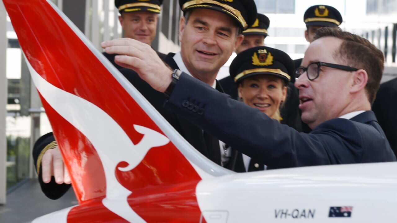 Qantas CEO Alan Joyce chats with QANTAS pilots