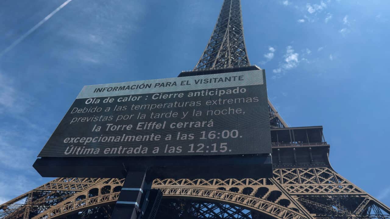 A screen announces the closure of the Eiffel Tower landmark due to a heatwave in Paris, France, 11 July 2026.