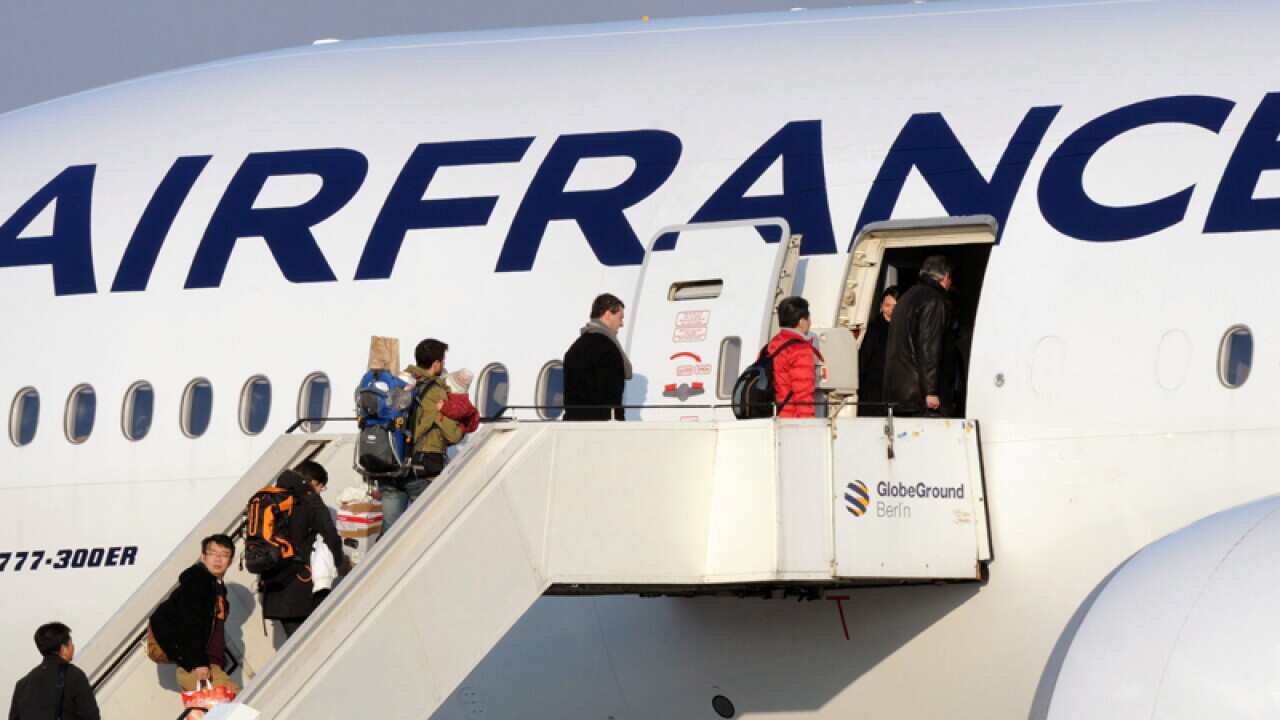 People boarding an Air France flight
