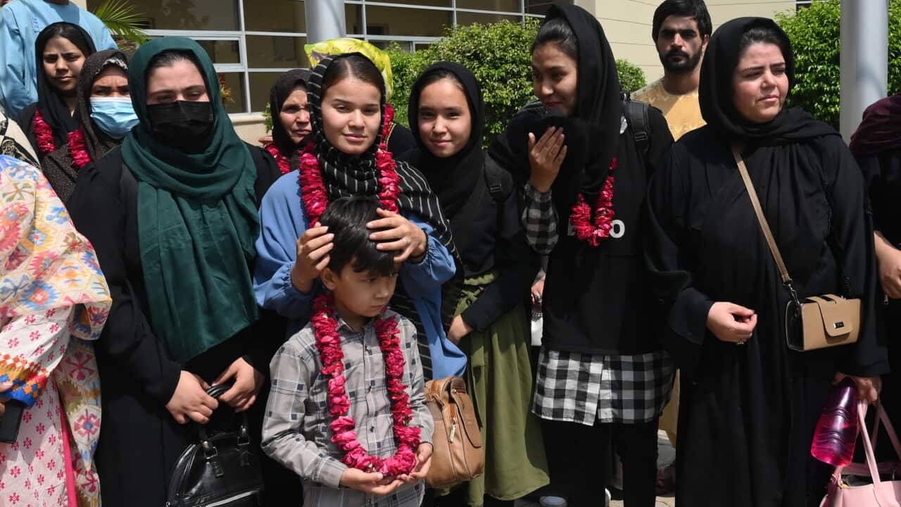 Afghanistan's female youth soccer players arrive at the Pakistani Football Federation office in Lahore after crossing into Pakistan.