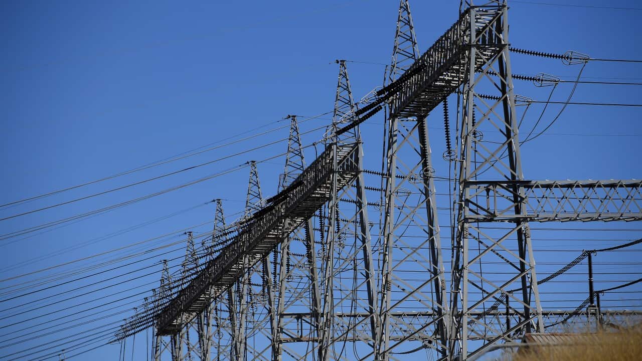 High voltage electricity transmission lines at a power station.