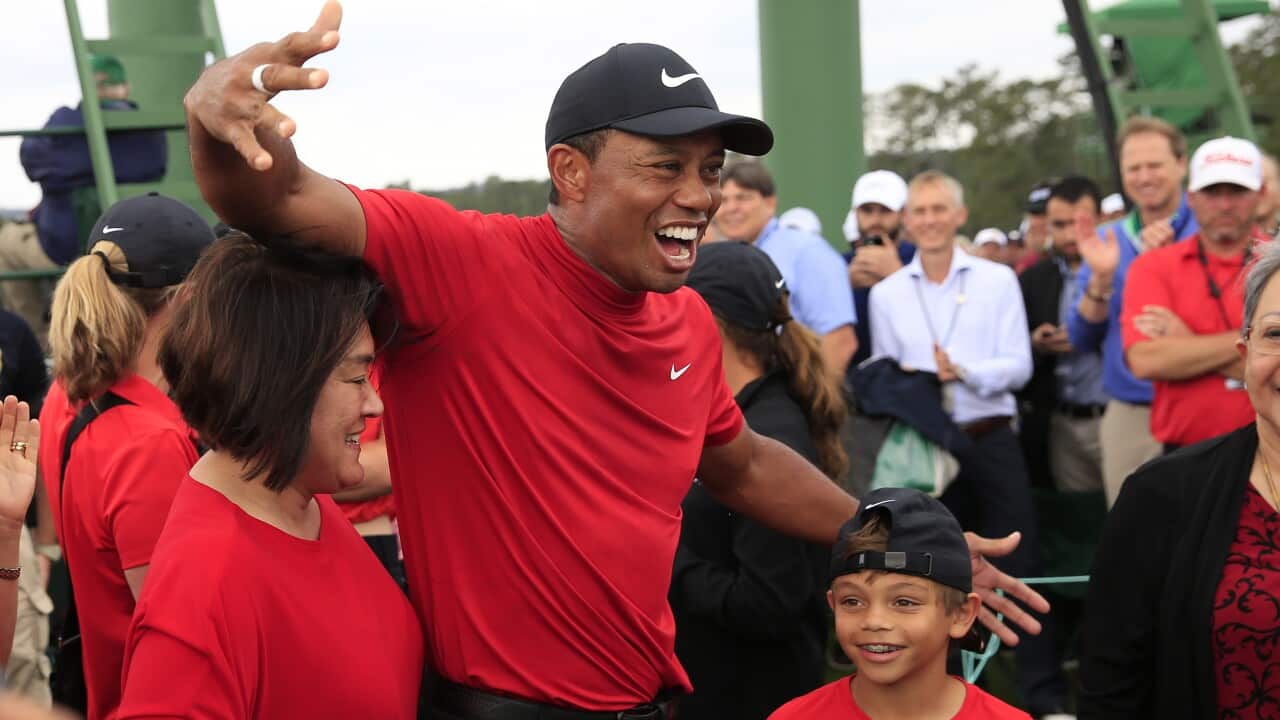 Tiger Woods of the US celebrates with family after winning the 2019 Masters Tournament